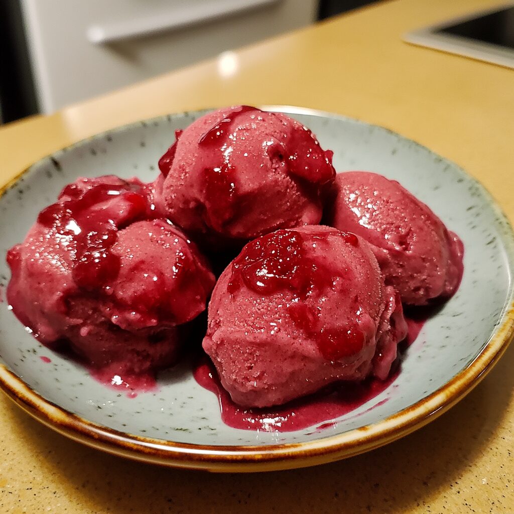 Cherry Sorbet served on a plate in natural light