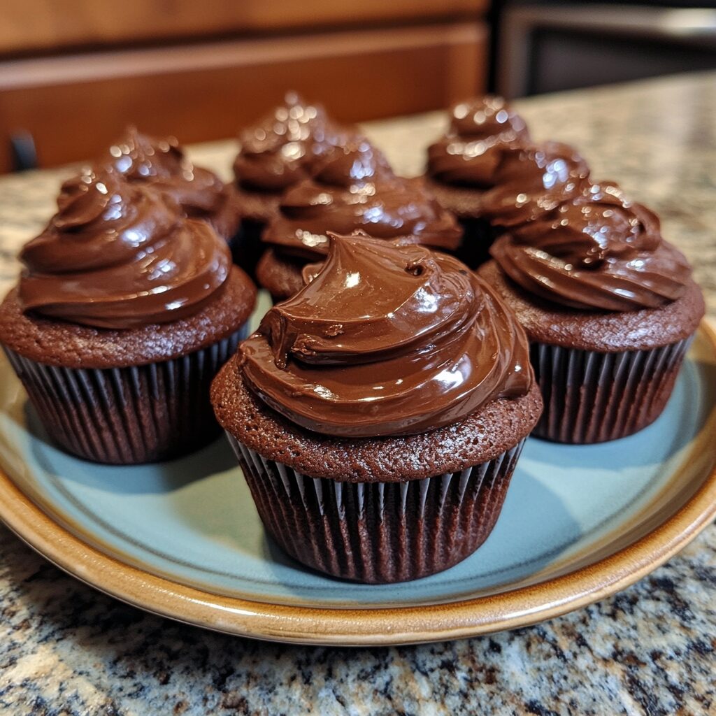 The Best Chocolate Cupcakes Super Easy Chocolate Cupcake Recipe served on a plate in natural light